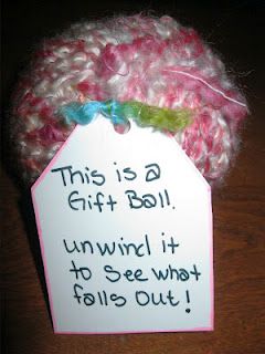 gift ball using yarn.  Wrap gift up inside the ball.  What a hoot!  Have to do this.  Hang these on the Christmas tree!!!  ♥