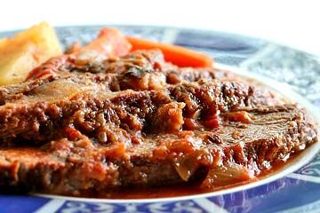 Dinner Recipes:Classic Swiss steak, inch-thick round steak browned and then slow cooked in a sauce of tomatoes, onion, garlic and herbs.