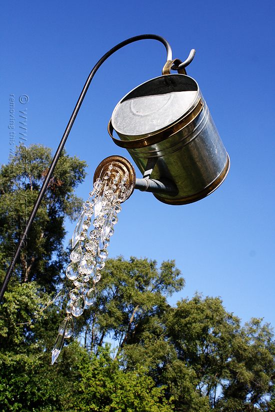 DIY garden art - A watering can that pours crystals
