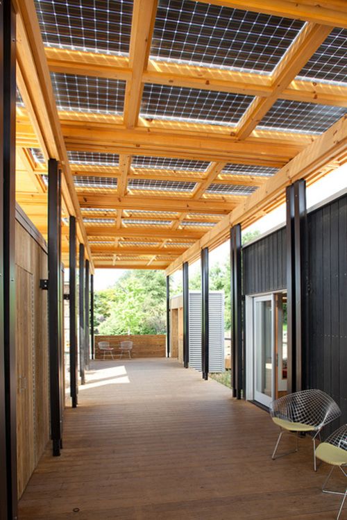 The bifacial solar panels above the breezeway collect direct sunlight from above and reflected light from below.