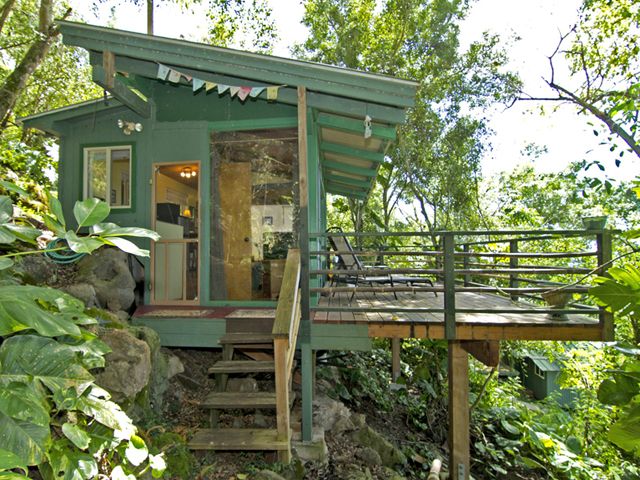 Set in a lush tropical paradise, the 250-square-foot Sunset Beach Treehouse Bungalow in Haleiwa, Hawaii overlooks one of the North Shore's most famous surf spots.