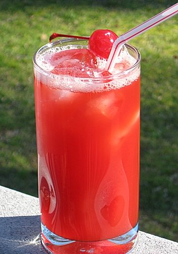 Alabama Slammer. Amaretto, Southern Comfort, OJ, splash of grenadine, served with a wedge of orange and a maraschino cherry.