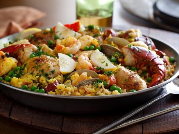 The Ultimate Paella: Tyler Florence's version of the ultimate food to feed a big family is filled with chicken, chorizo and fish. Get your ingredients organized in advance, then layer flavors later while this one-pan meal cooks.