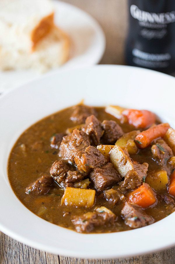 Guinness Beef Stew - Incredibly tender meat, potatoes and carrots, all swimming in a perfectly smooth and rich Guinness-spiked sauce. Absolutely delicious!