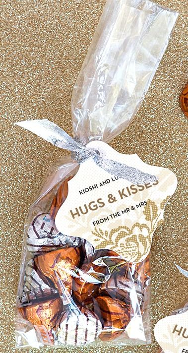Little paper bags with our initials and wedding date on it at the candy buffet. Hugs and Kisses Wedding Favors